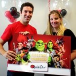 Quickflix head of member services Andrew Kirkwood with the 10 millionth DVD subscriber, Alison Heuer