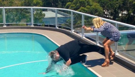 Kyle gets pushed in the pool