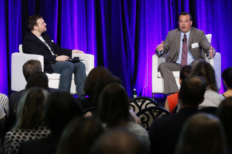 Tim Burrowes and Joe Jareck speaking on stage at Comms Conn.