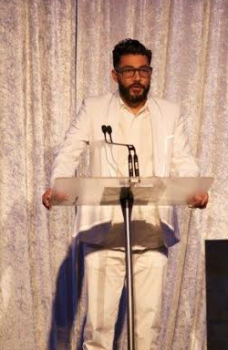 Dave Lo speaking at the Star Awards