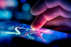 Businessman Checking Data - thinkstock