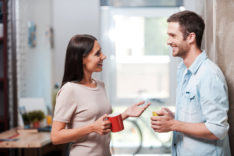 office couple talking ThinkstockPhotos