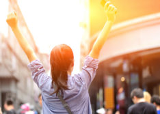 cheering woman on the street