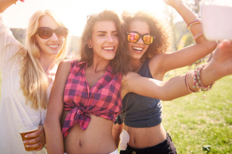 millennial women with mobile phone -ThinkstockPhotos-479785966