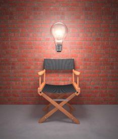 Lamp lit up on the director's chair.