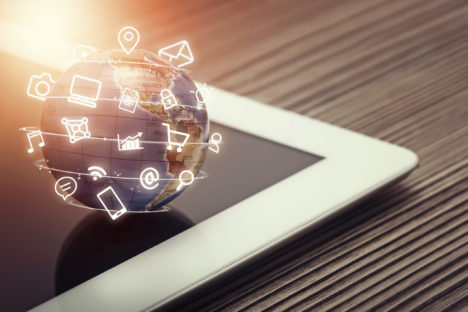 thinkstockphotos-media-apps-mobile-table-ipad-globe-digital