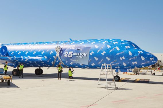 Gift-wrapped plane reminds holiday makers to enter Powerball
