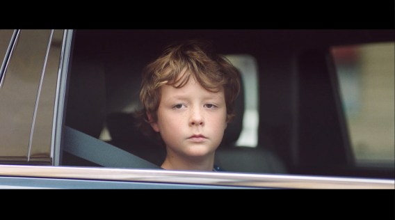 Young boy wins stare-off with man checking out his mum in latest Toyota Kluger campaign