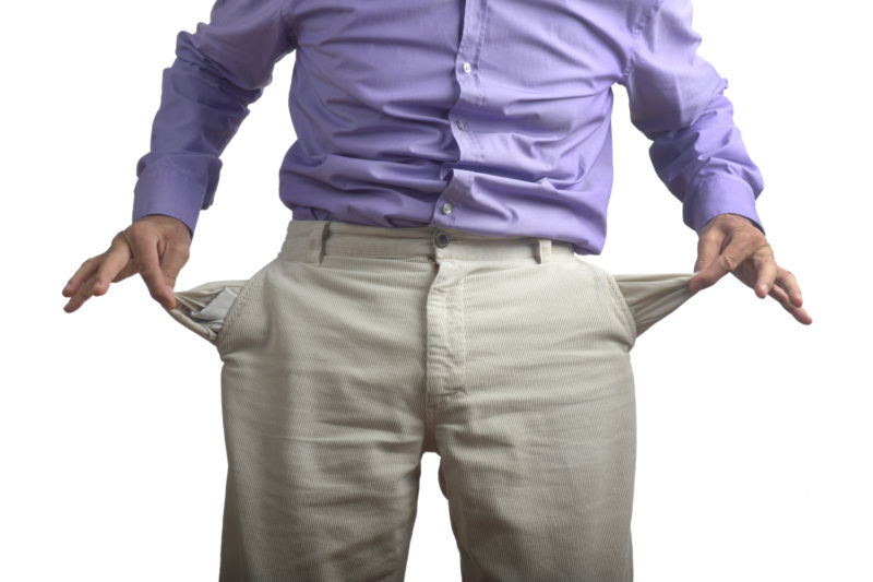 man with empty pockets broke