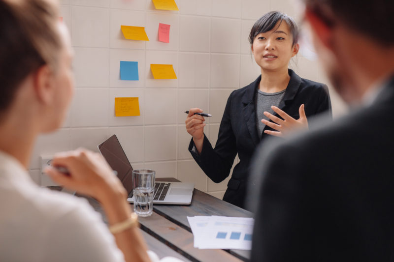 thinkstockphotos-woman-boardroom-presentation-pitch-business