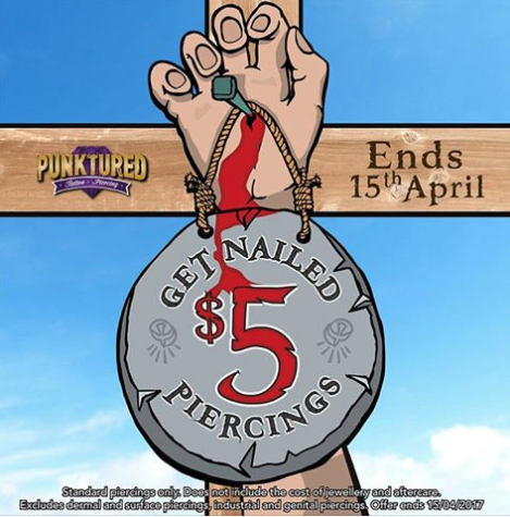 ‘Get nailed’: Ad watchdog slams poster linking body piercings with crucifixion of Christ