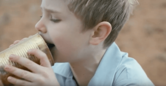 Boy connects to Australia via a tin can telephone in Royal Far West rebrand campaign