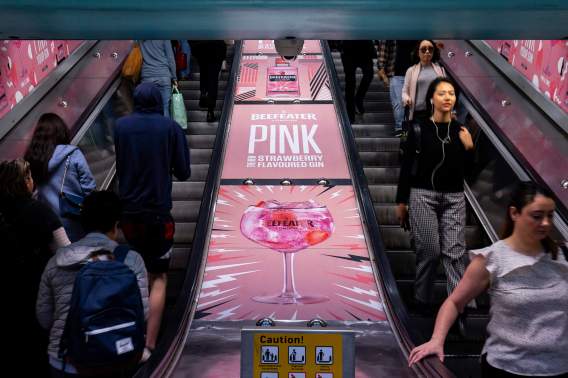 Blue 449 and Adshel wrap stations in strawberry-scented Beefeater Gin signage