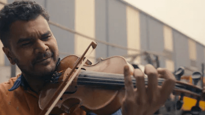 Working class man becomes a violinist in latest Optus ad